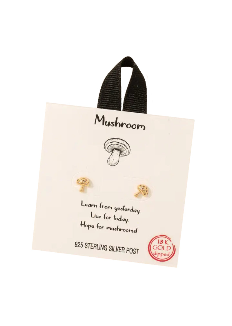 A pair of small gold stud earrings shaped like mushrooms.