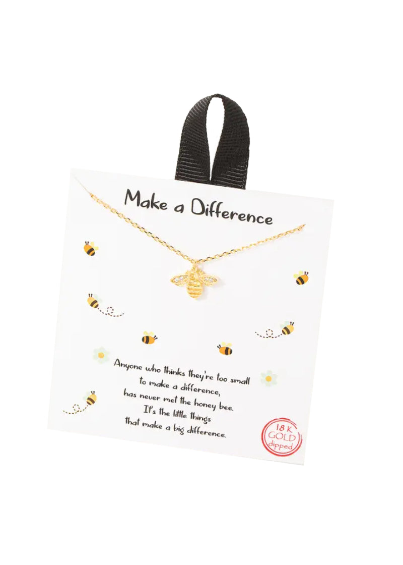 Gold chain necklace with gold bee pendant.