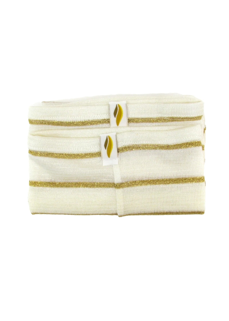 A folded pair of cream-colored legwarmers with thin, gold, horizontal stripes.