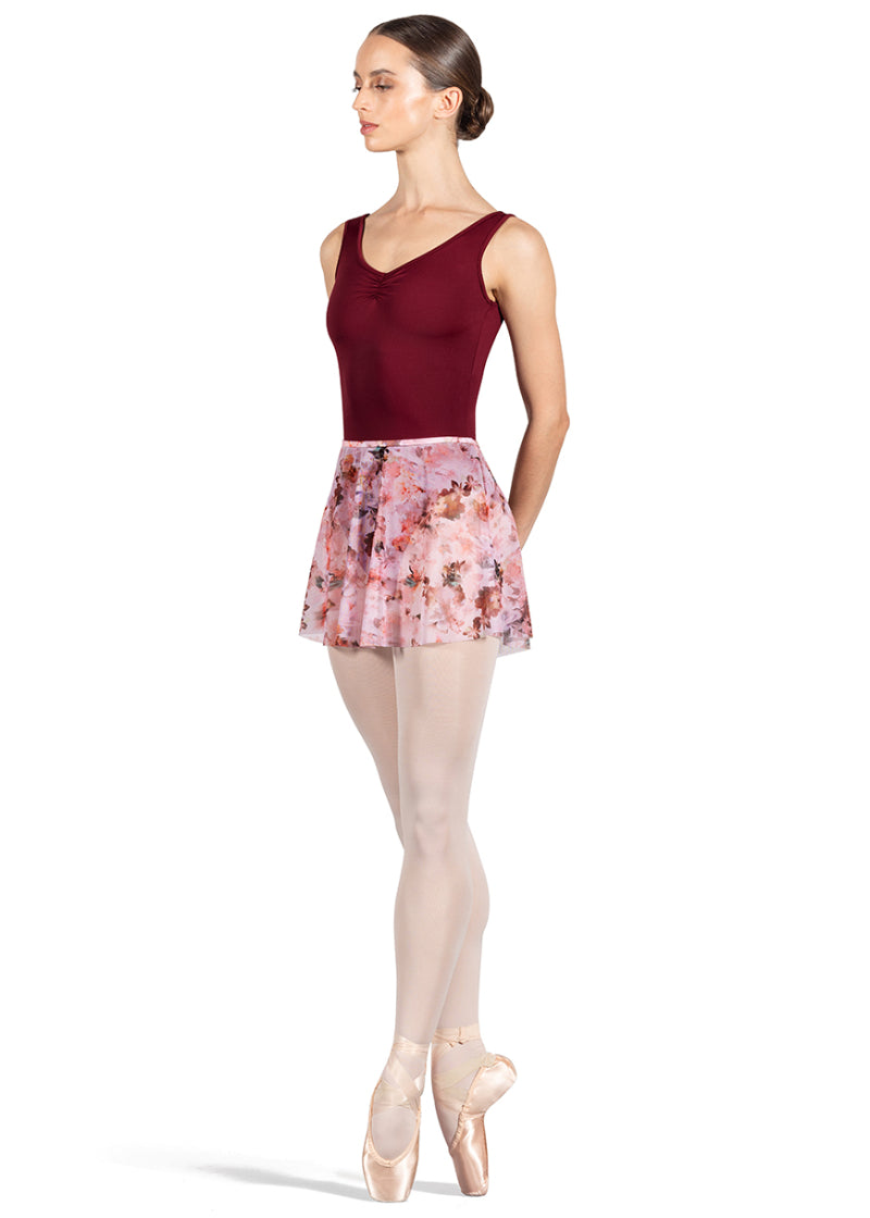 Bloch mesh pull-on skirt in pink and red floral print.