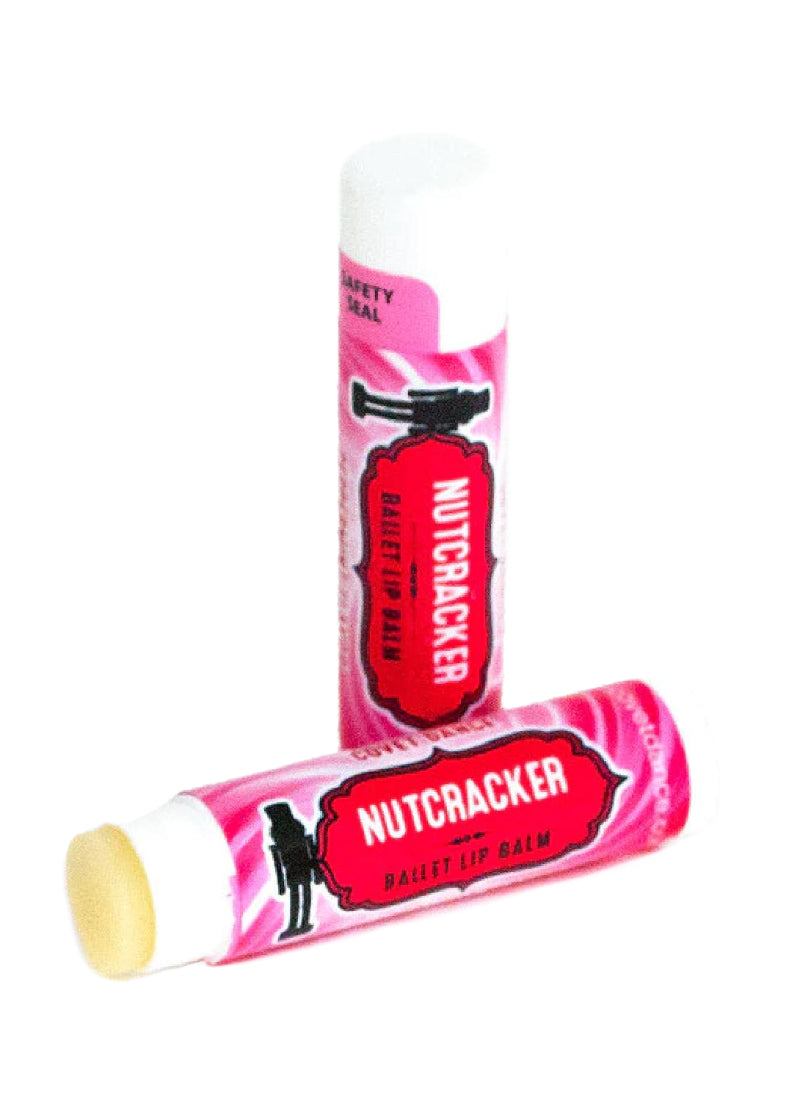 Two pink tubes of Nutcracker lip balm.