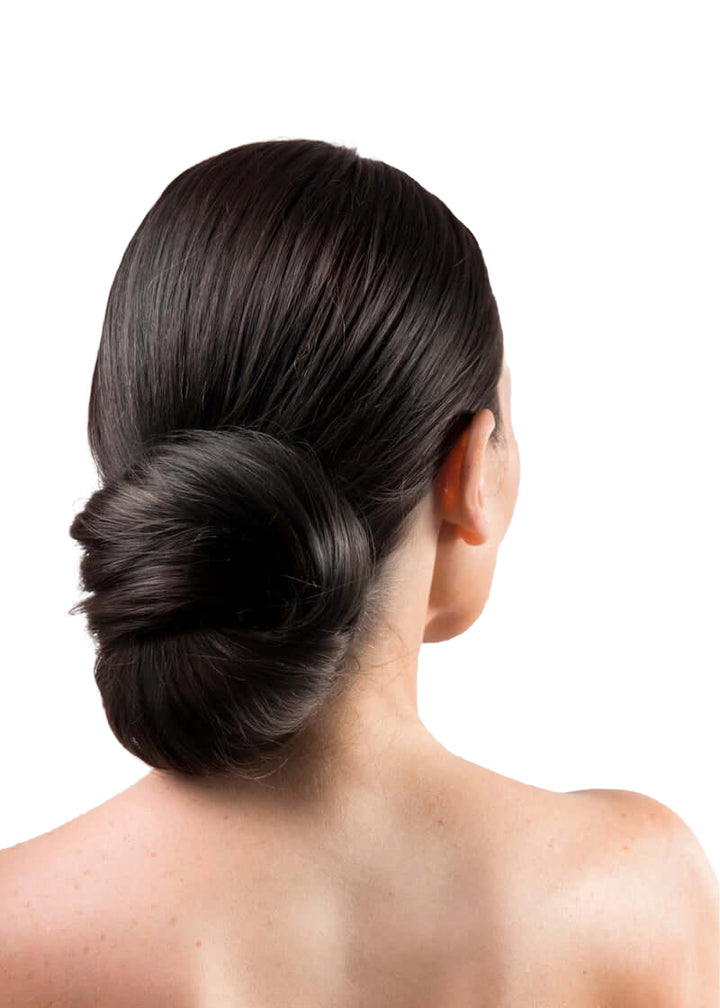 A model with black hair demonstrating the use of Frenchies Hair Pins in Black for creating an elegant hair bun