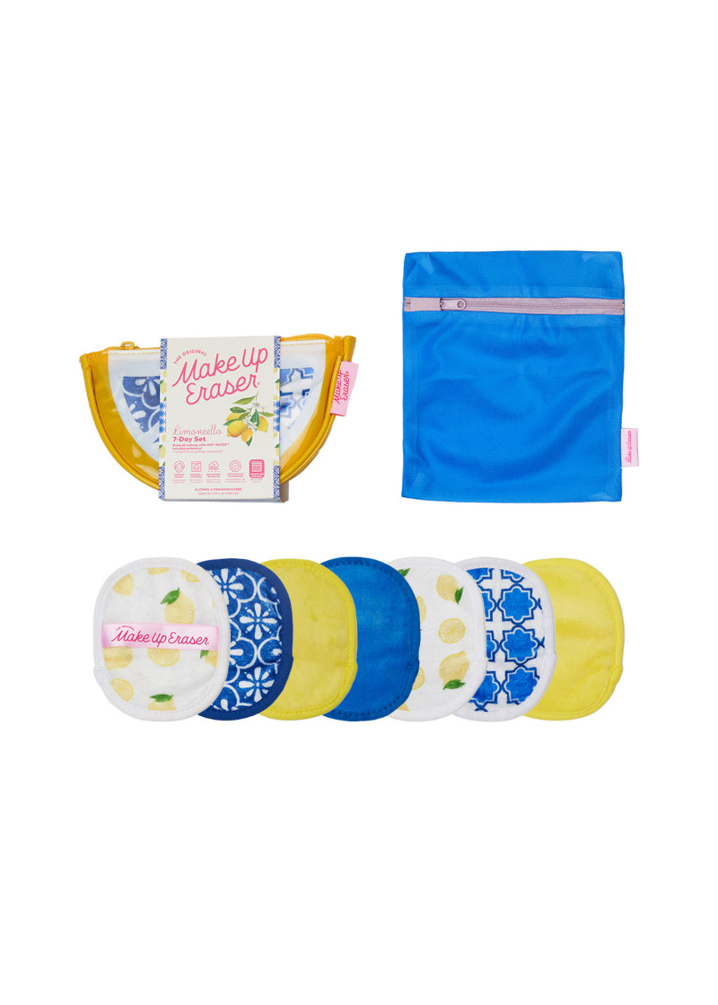 Set of seven makeup eraser pads with blue, yellow, blue tile print, and lemon print, including blue zipper storage bag.