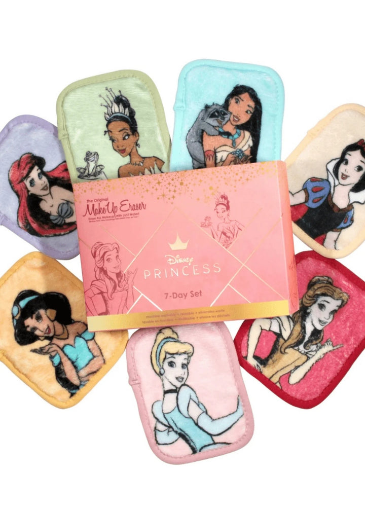 MakeUp Eraser Ultimate Disney Princess Seven Day Set featuring mini makeup erasers with on of each princess: Ariel, Belle, Cinderella, Jasmine, Pocahontas, Snow White, and Tiana, in a beautiful pink and gold gift box