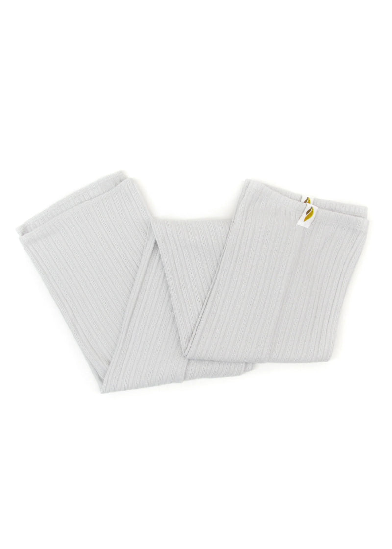 RubiaWear legwarmers in pale gray.