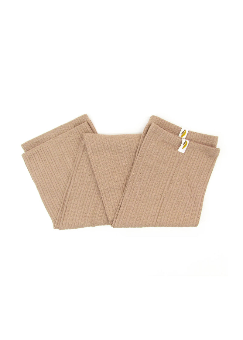 RubiaWear shorty legwarmers in tan.