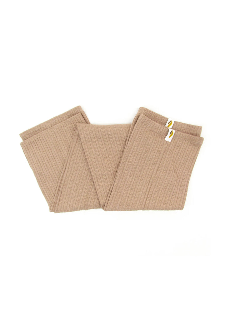 RubiaWear shorty legwarmers in tan.