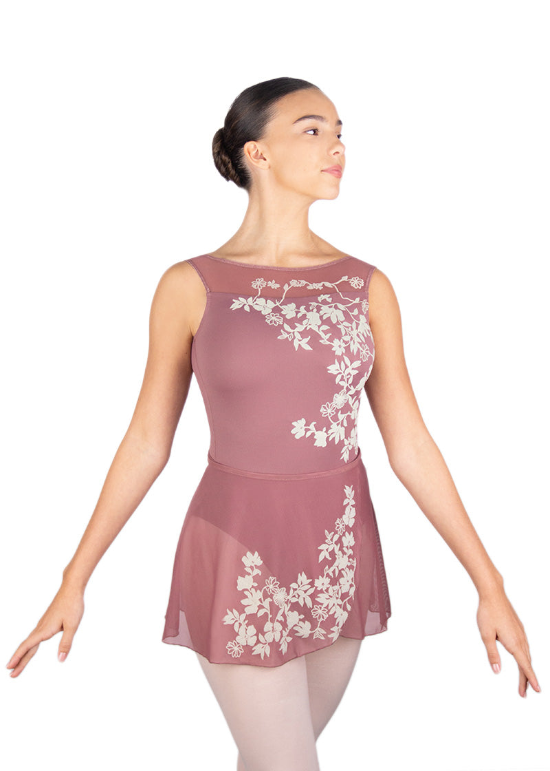 Ballet Rosa Women's Pink Tank Leotard with mesh scoop neckline and white floral flocking, and pink mesh skirt with white floral flocking.