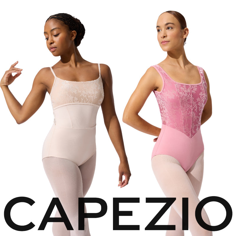 Capezio In-Silhouette Dancewear Collection featuring floral burnout velvet and figure-flattering seams, pictured here with two different styles of leotard in Cystral Gray and Blush Pink, shown on two ballet dancers