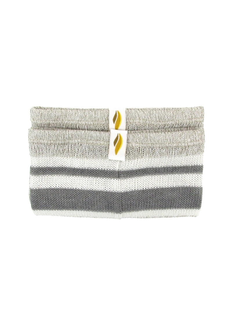 A folded pair of legwarmers with light grey, dark grey, and white horizontal stripes.