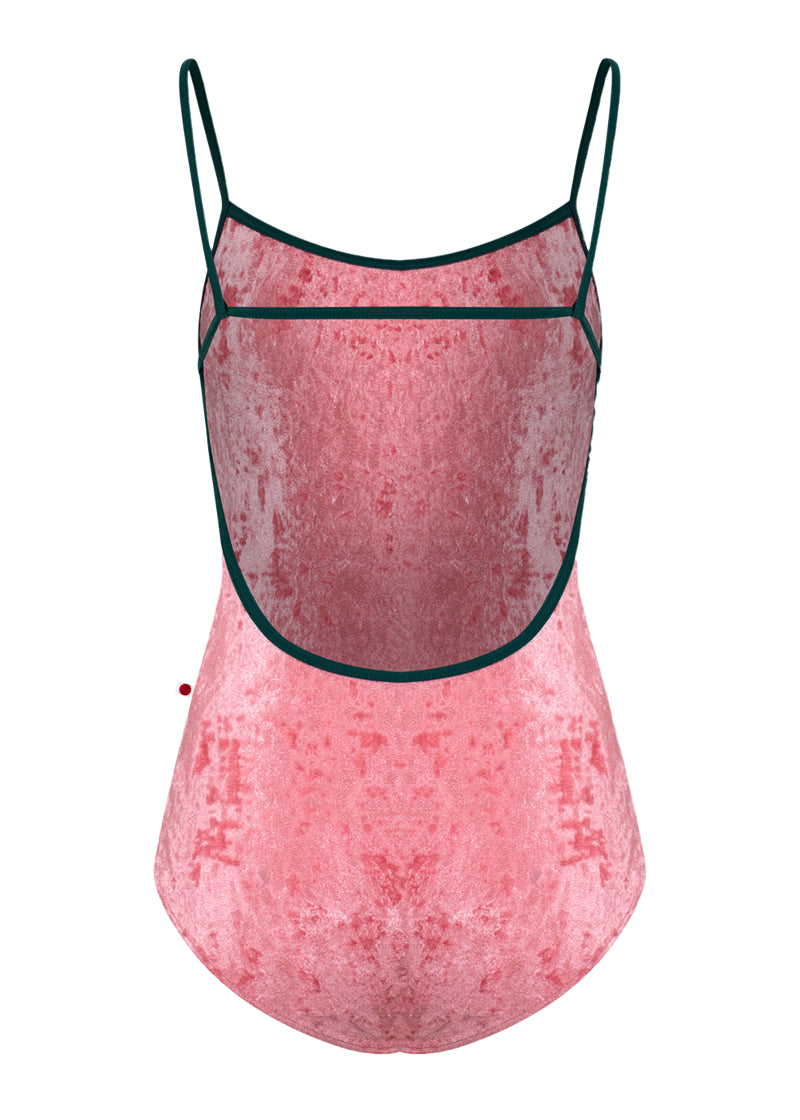 Yumiko pink crushed velvet Tamara camisole leotard with dark green trim and straps and a low-cut back.