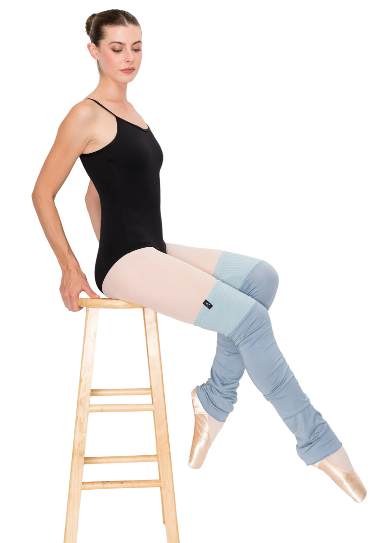 Aluvie women's Aura knee-high legwarmers in light blue with lighter blue knit band above the knee.