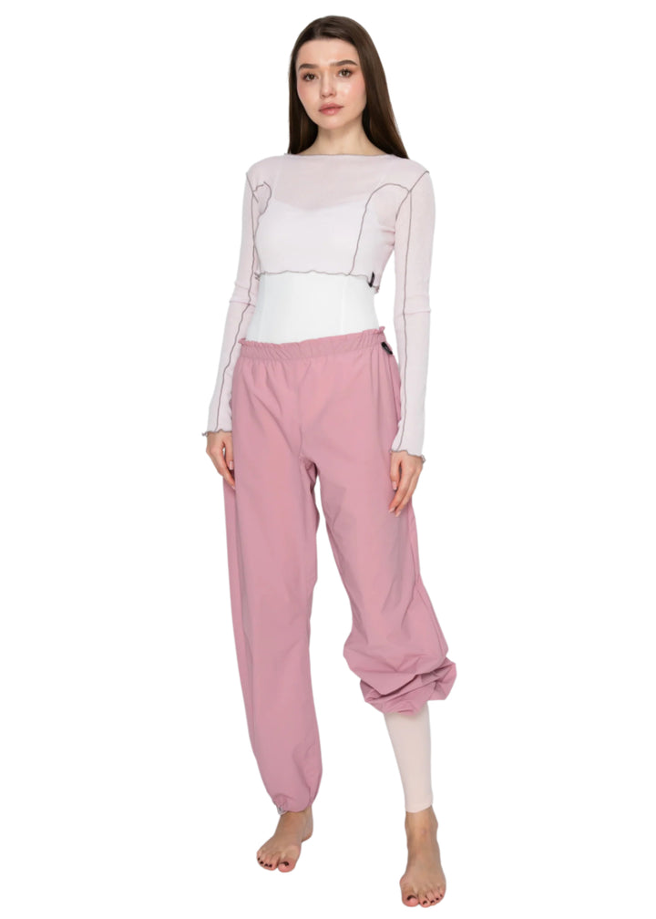 Aluvie women's Bree pants in pink with cinched waistband and drawstring hems.