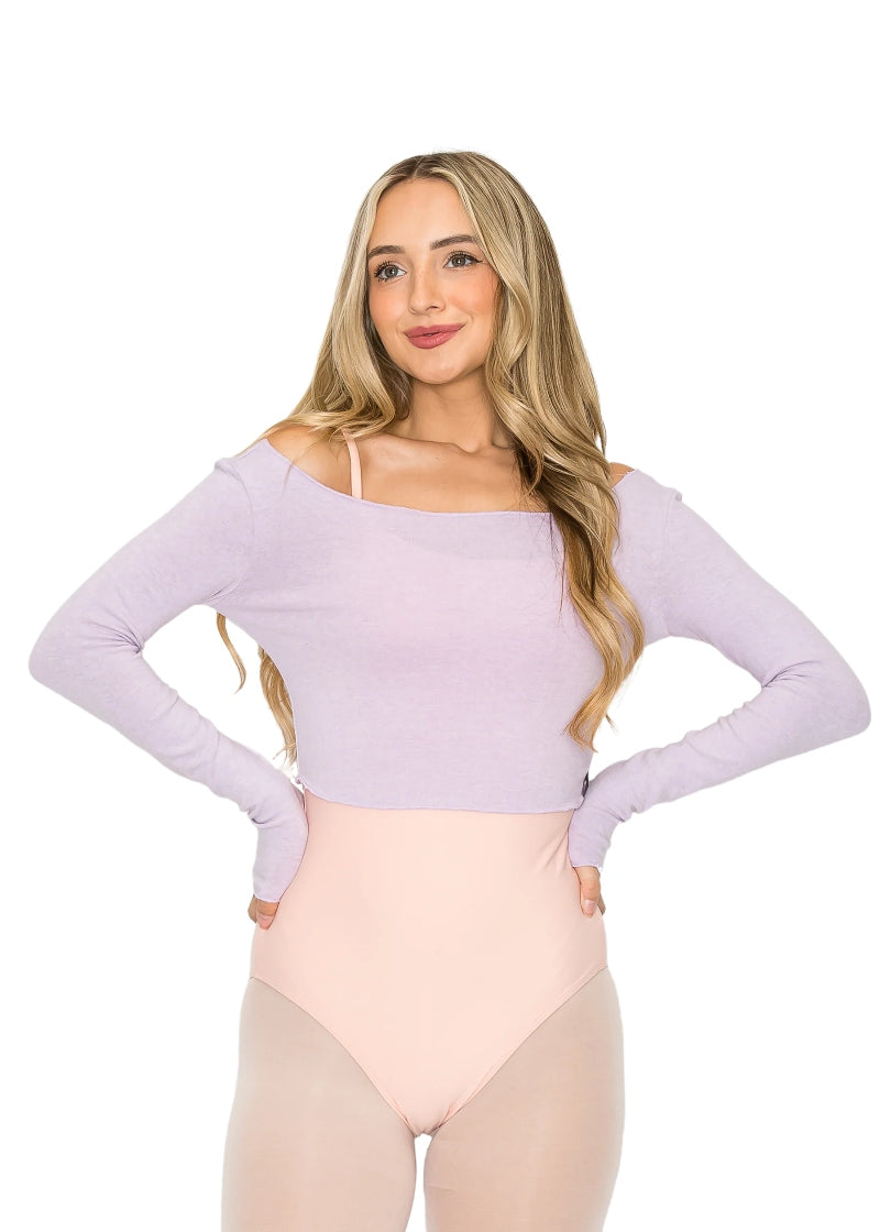 Photo of model wearing the super soft Aluvie AS003 Chloe Long Sleeve Knit Crop Top in Lavender, a light purple color, with full-length sleeves and an attractive wide boat-neckline