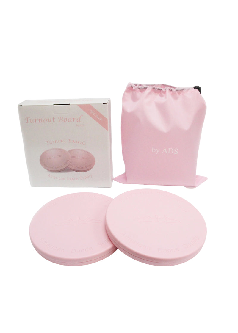 Two pink circular turnout boards with text and feet in first position, with pink drawstring carrying bag.