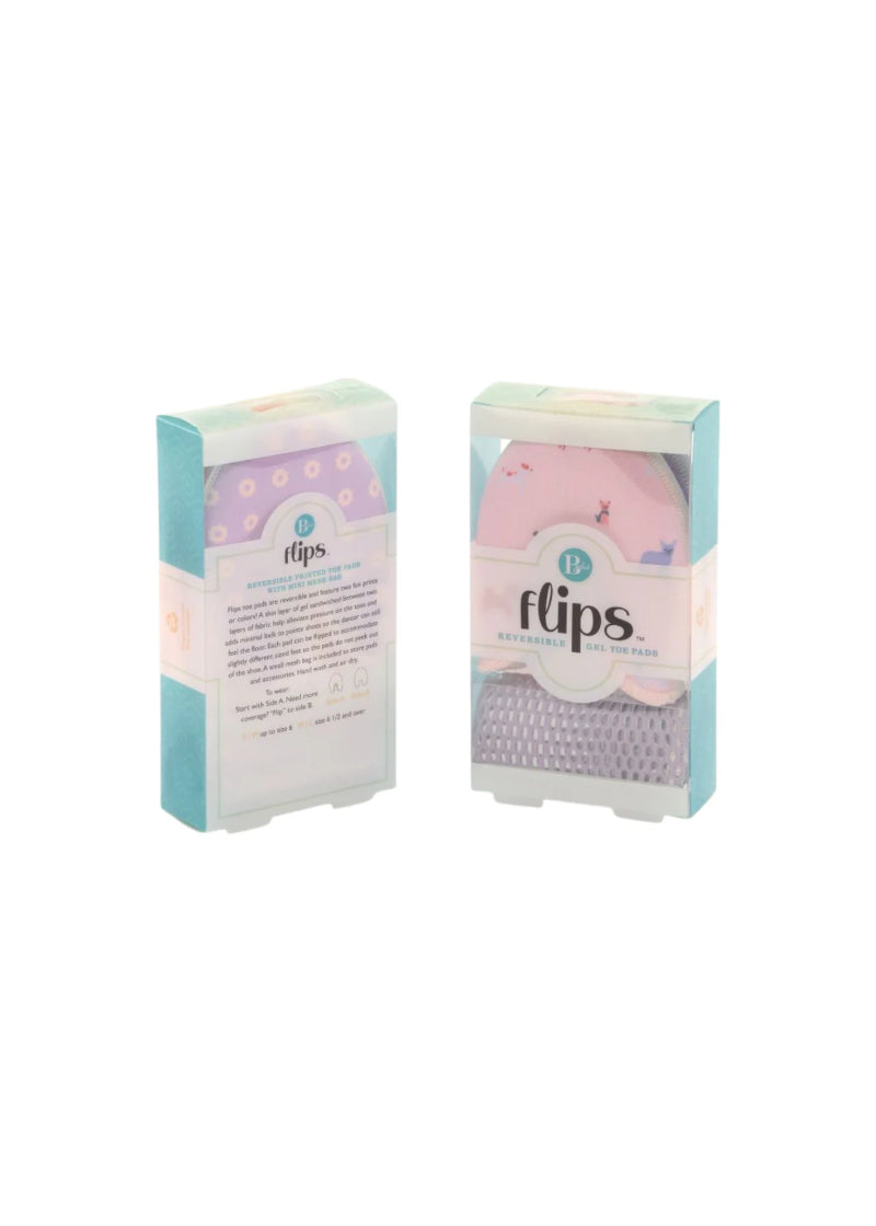 Pink and purple reversible toe pads in packaging with purple mesh drawstring bag.
