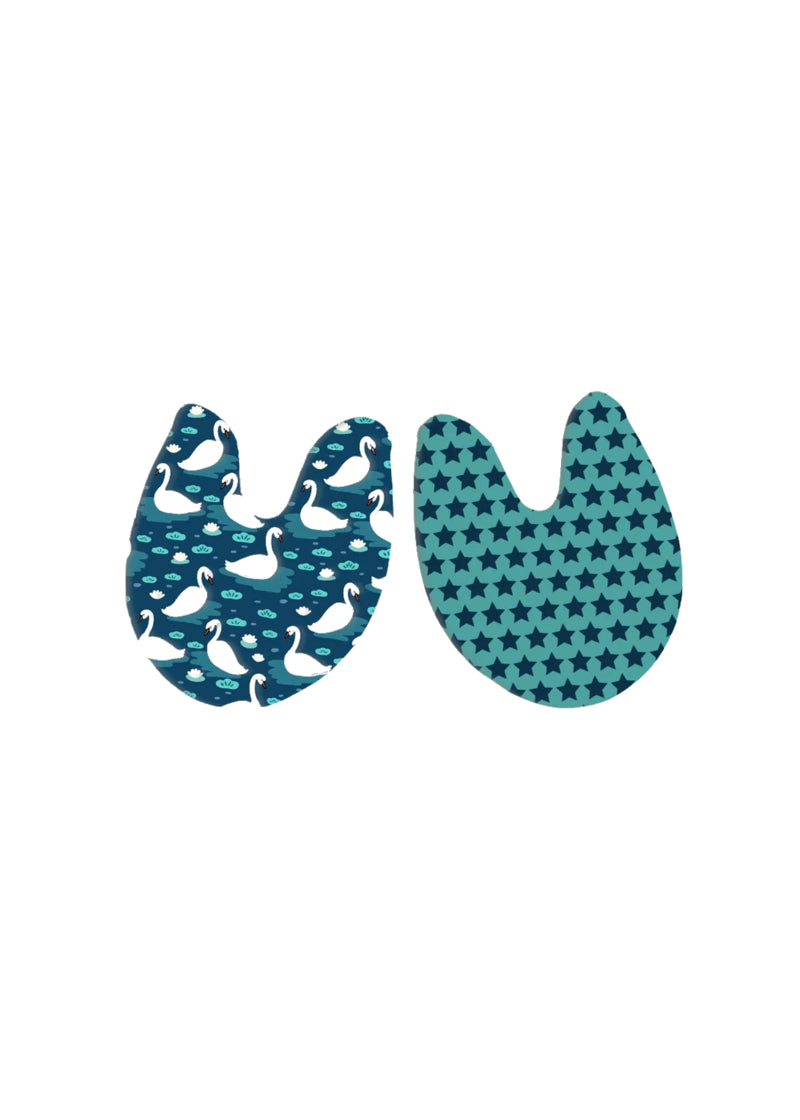 Blue toe pads printed with swans on one side and dark blue stars on the other side.