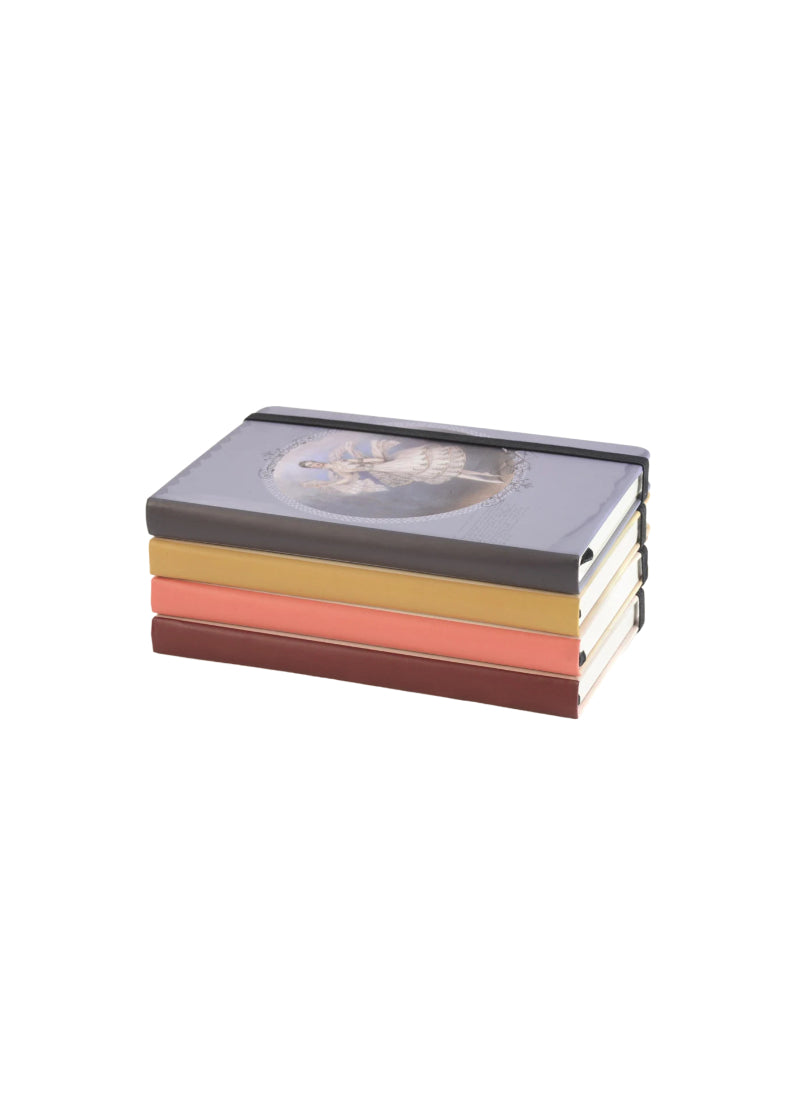 Stack of mini dance journals in different colors with elastic bands.