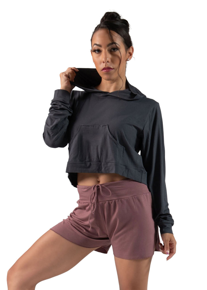 Ballet Rosa Createur Bamboo Collection 115VIA Women's Ren Stretch Bamboo Crop Top Hoodie with Kangaroo Pouch Pocket in Nuit Dark Grey, shown on a ballet dancer
