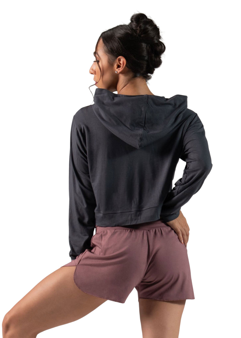 Ballet Rosa Createur Bamboo Collection 115VIA Women's Ren Stretch Bamboo Crop Top Hoodie with Kangaroo Pouch Pocket in Nuit Dark Grey, shown on a ballet dancer