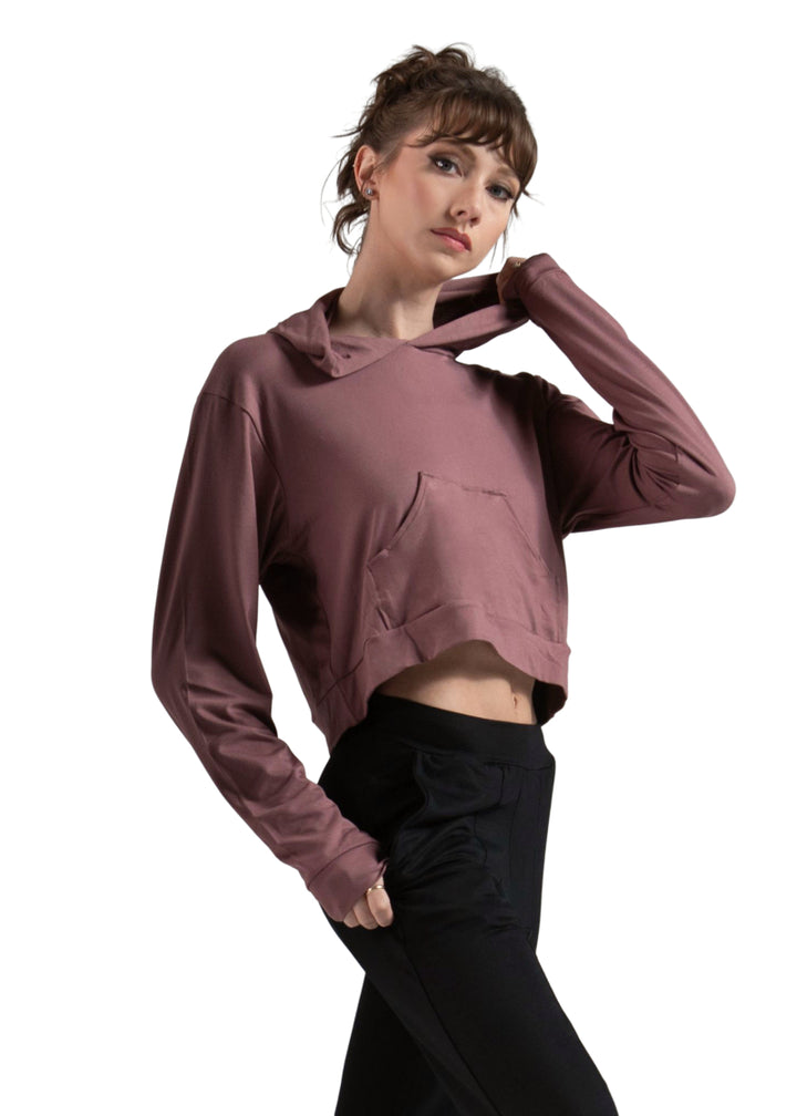 Ballet Rosa Createur Bamboo Collection 115VIA Women's Ren Stretch Bamboo Crop Top Hoodie with Kangaroo Pouch Pocket in Wild Rose Dusty Pink, shown on a ballet dancer