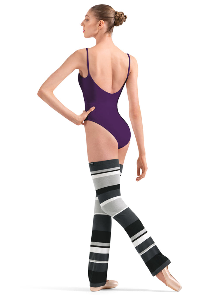 Bloch W11007 Women's Striped Thigh-High Legwarmers with Black, Grey, and White Stripes with a relaxed fit ankle, shown on a pointe dancer