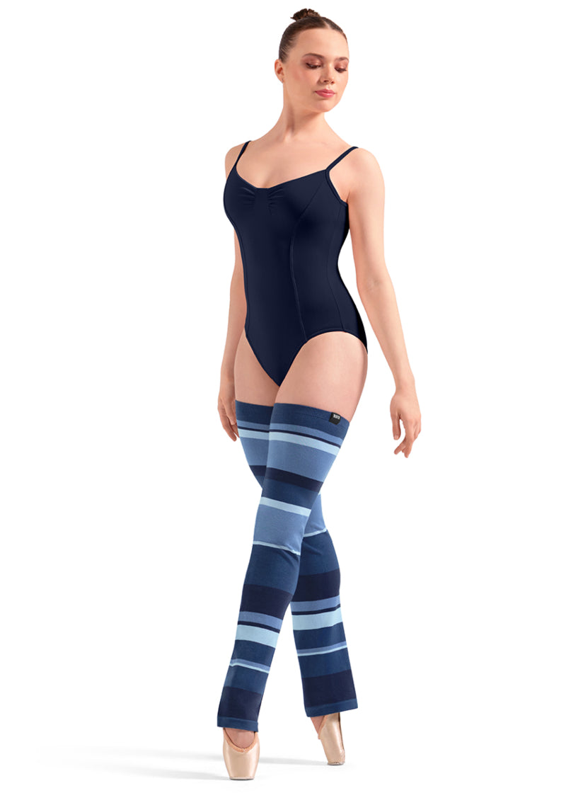 Bloch W11007 Women's Striped Thigh-High Legwarmers with Dark Blue, Medium Blue, and Light Blue Stripes with a relaxed fit ankle, shown on a pointe dancer