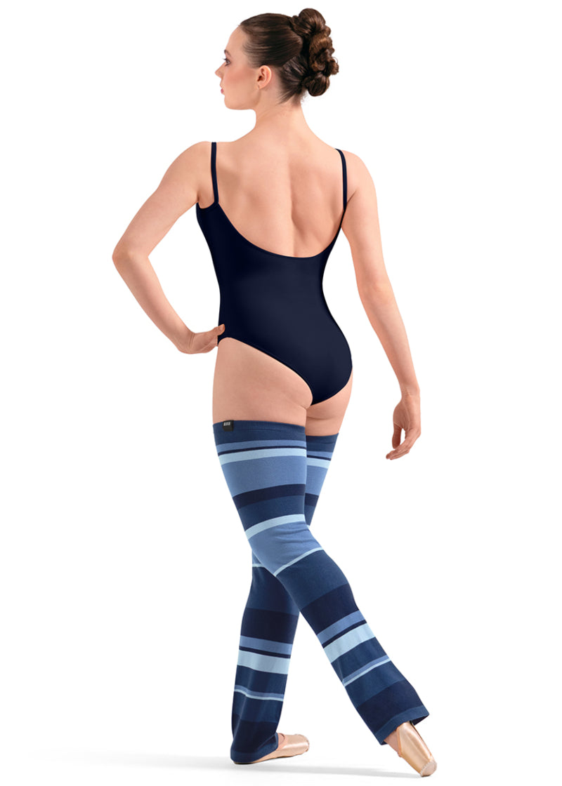 Bloch W11007 Women's Striped Thigh-High Legwarmers with Dark Blue, Medium Blue, and Light Blue Stripes with a relaxed fit ankle, shown on a pointe dancer