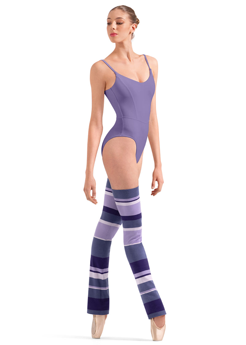 Bloch W11007 Women's Striped Thigh-High Legwarmers with Dark Purple, Grape, Lilac, and cream-colored Stripes with a relaxed fit ankle, shown on a pointe dancer