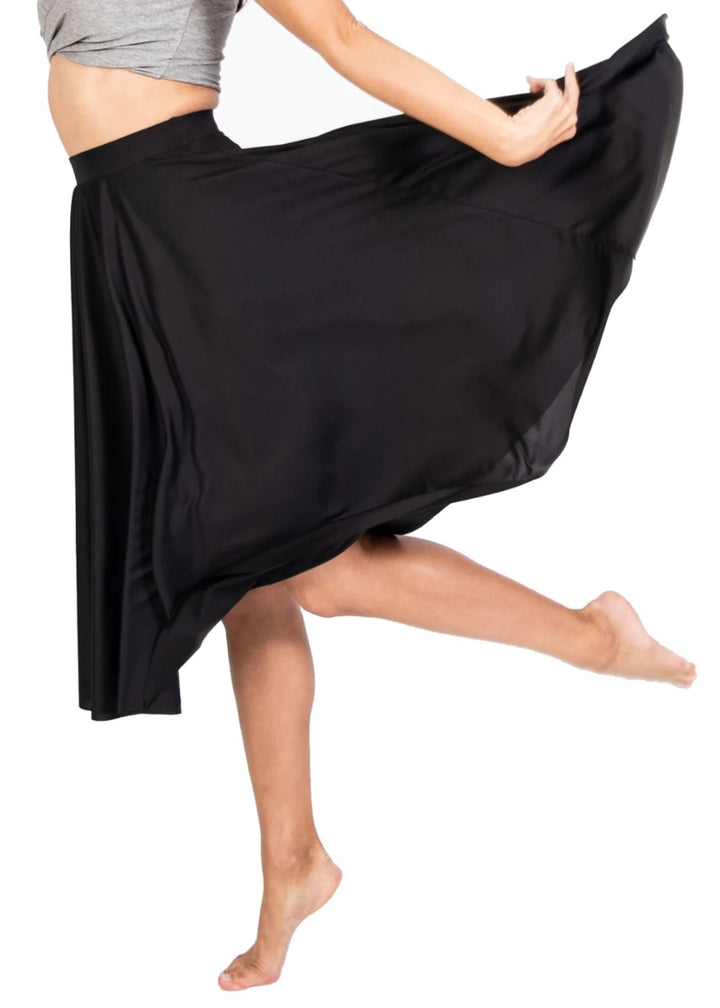 Body Wrappers 511 Women's Below-the-Knee Character Circle Skirt in Black, shown on a dancer