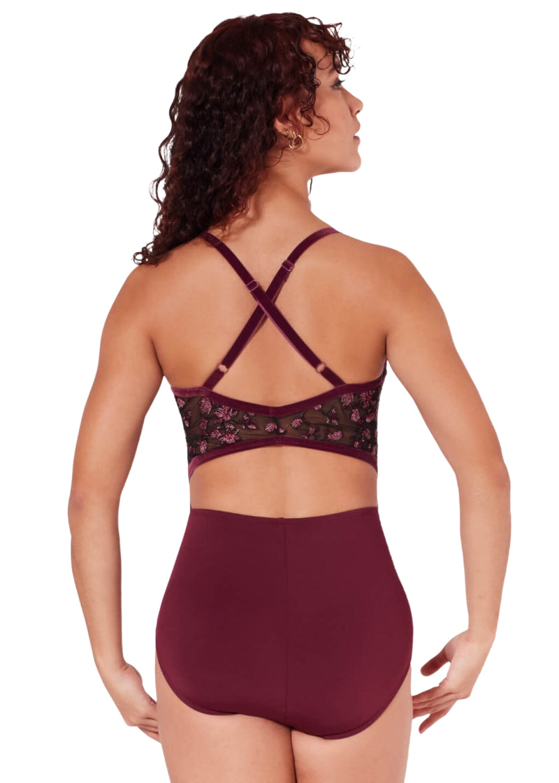 Capezio women's Charisma camisole leotard in dark red with crossed back straps and floral embroidered mesh back panel.