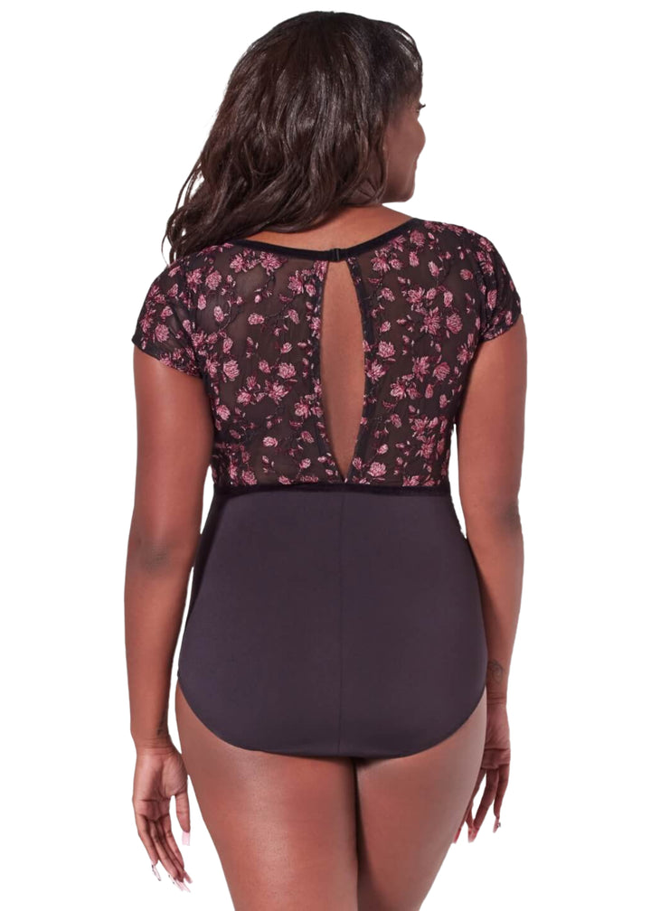 Capezio women's Fascination short sleeve leotard in black with floral embroidered mesh panels and keyhole back.