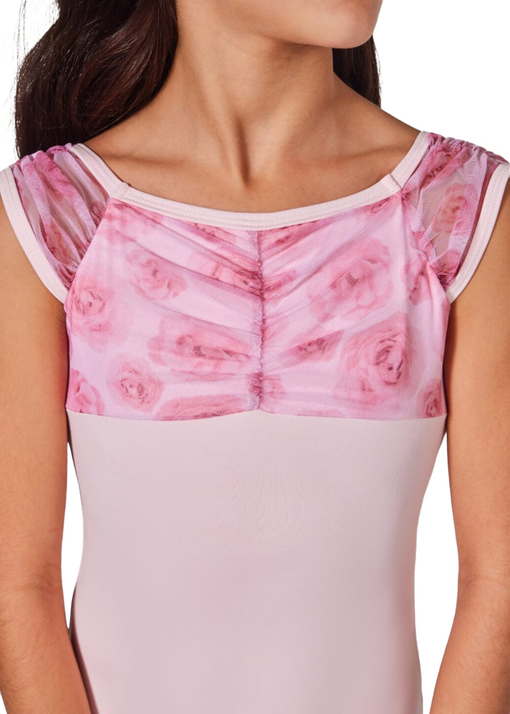 Capezio girls' Rosa cap sleeve leotard in light pink with floral print mesh sleeves and ruched bust.