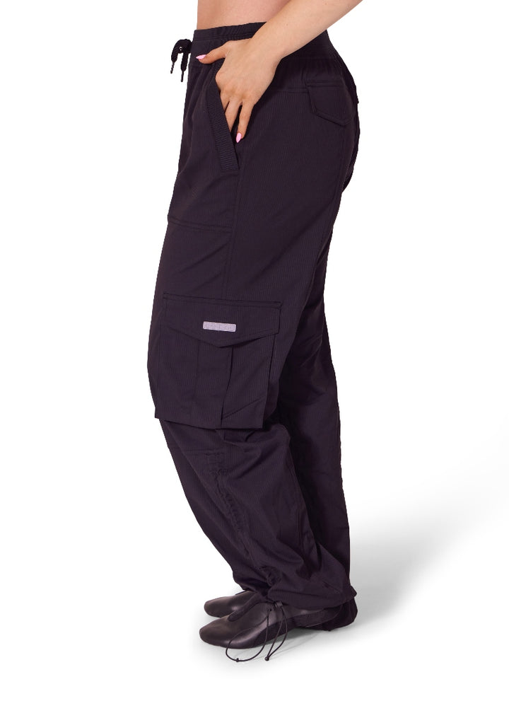 Capezio Jet Setter Dance Dynamics Studio Joggers F12555W in black with cargo pockets and drawstring ankle openings