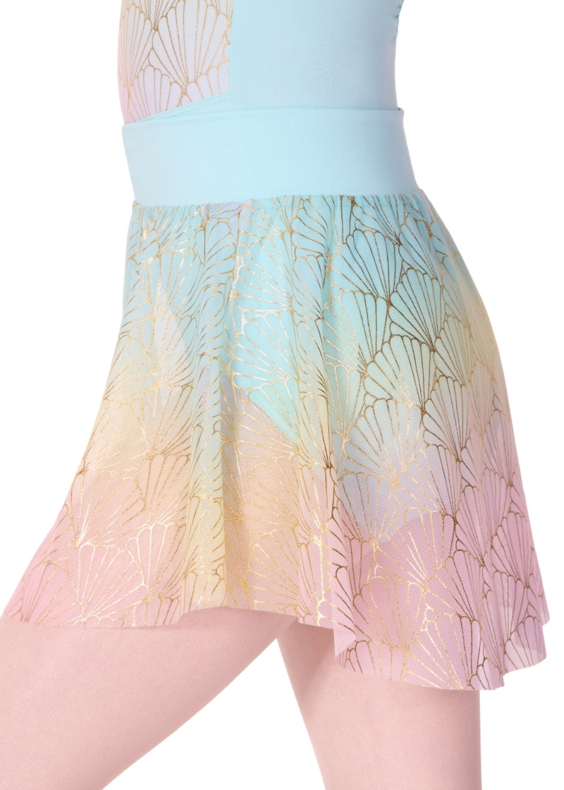 Capezio youth Sand Dollar pull-on skirt with light blue, pinch front waistband, light blue, yellow, and pink color gradient, and shiny gold seashell print.