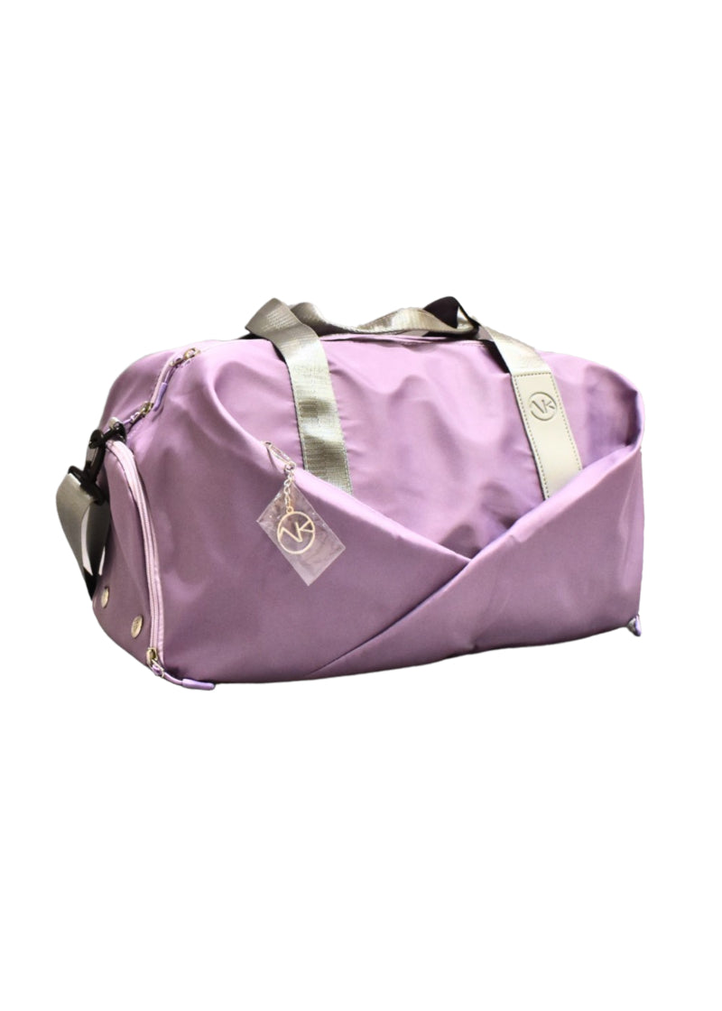 AK Dancewear CarryAll duffel bag in light purple with grey straps and handles.