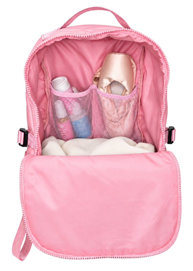 Interior view of Covet Dance Bravo Backpack with multiple pockets and adjustable straps in Pink