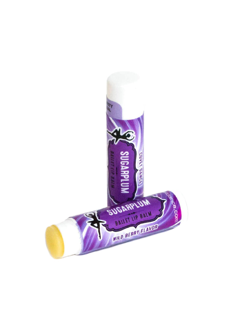 Two purple tubes of Sugarplum lip balm.