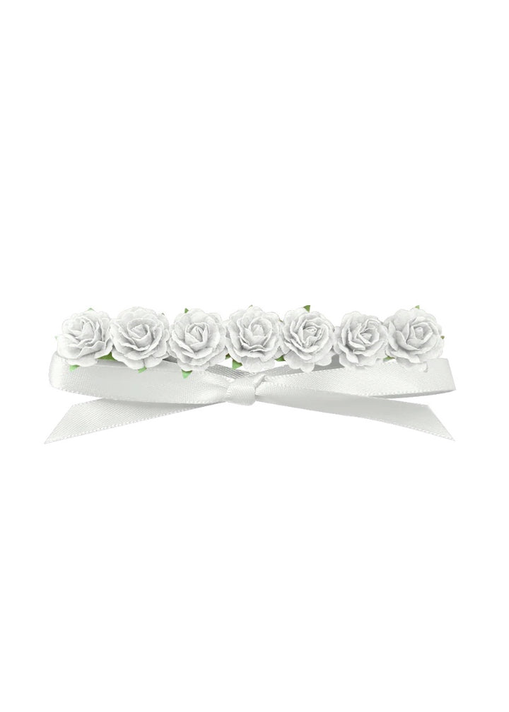 White flowers attached to white ribbon.