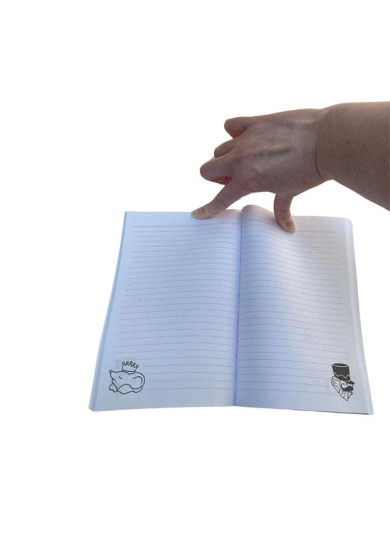 Lined pages inside journal, with nutcracker and mouse king faces in bottom page corners.