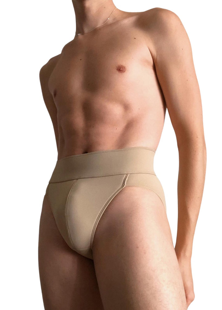 Beige full seat dance belt.