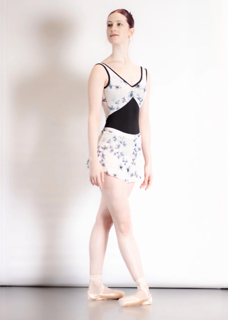 Danse de Paris women's Violette tank leotard with black bottom and blue and white floral velvet top with pinch v-neckline.