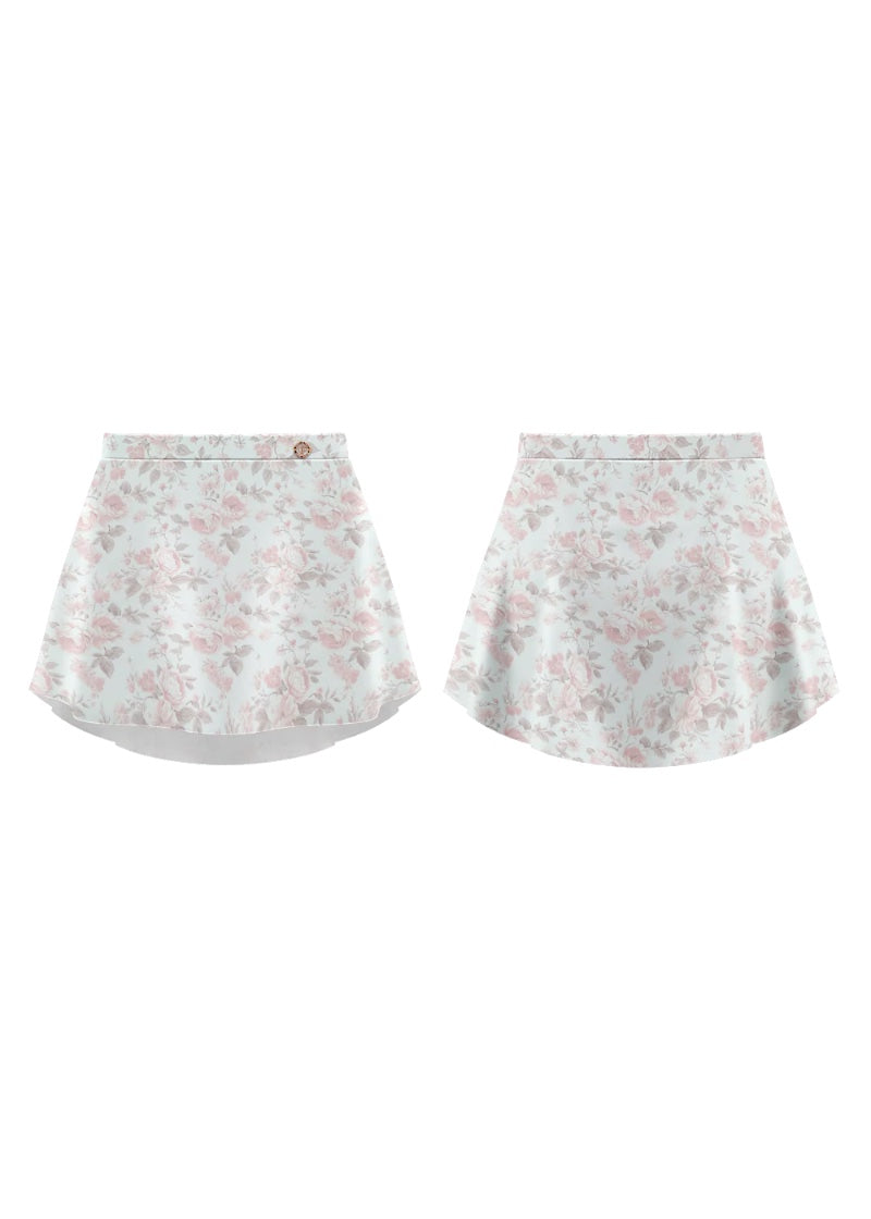 Danse de Paris pull-on skirt in white with pink floral print.