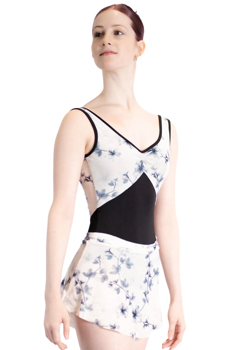 Danse de Paris women's high-low pull-on skirt in white velvet with blue floral print.