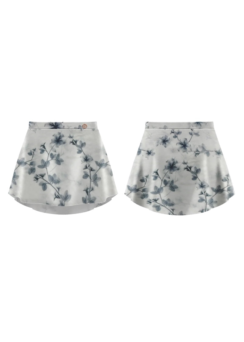 Danse de Paris women's high-low pull-on skirt in white velvet with blue floral print.