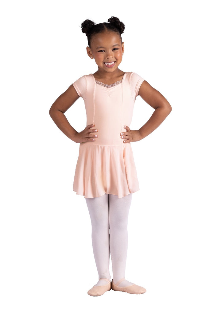 Danznmotion youth Isadora cap sleeve dress in light pink with pinch front, ruffle trimmed neckline and princess seams.