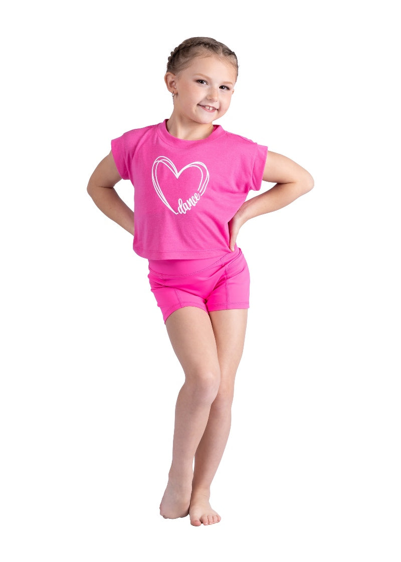 Danznmotion youth cropped crewneck tee in bright pink with cuffed cap sleeves and white scribble heart "dance" design.