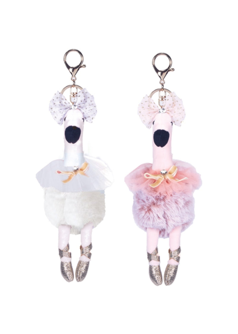 plush swan in tutu attached to a keychain in white and pink