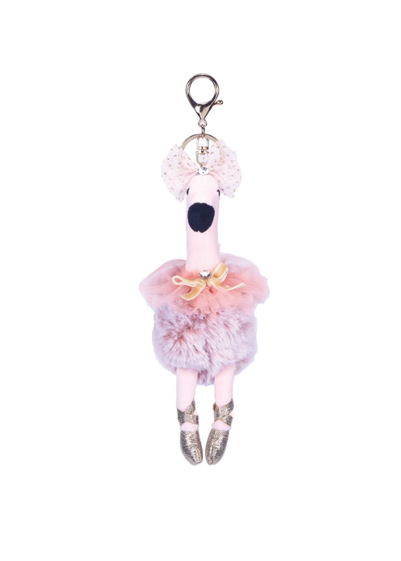 plush swan in tutu attached to a keychain in pink