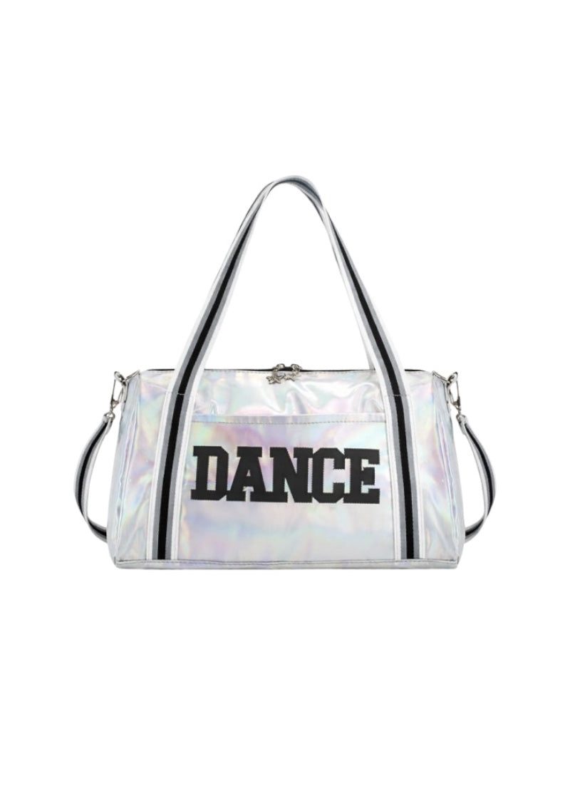 Dasha Designs silver iridescent duffel bag with "DANCE" in black block lettering and black and grey striped carrying handles.